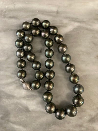 11x13.5mm Tahitian graduated round pearl strand, 14KW ball clasp, 17"