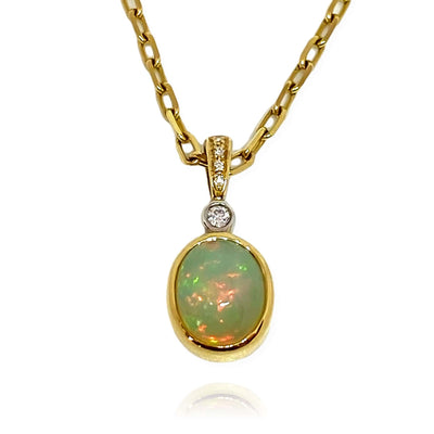 Mark Areias Jewelers Jewellery & Watches Natural Ethiopian Oval Opal & Diamond Pendant 14K Yellow Gold 9x11mm 2.44 Carat